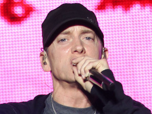 Rap Artist performing at the 'Epicenter Twenty Ten' event in Fontana Fontana, California - 25.09.10{EMINEM} made a triumphant return to California on Saturday night (25Sep10) when he stole the show from co-headliners {KISS} at the Epicenter Twenty Ten festival in Fontana. The rap!   per hit the stage in dramatic fashion after a Star Wars-type script scrolled across a space-themed giant screen, calling the show the Detroit native's "Recovery". The cinematic note read, "In 2005, after completing a U.S. tour, Eminem stopped performing. Eminem entered rehab, a European tour was cancelled and there were rumors that he was retiring. Over the following years, Eminem appeared to be detached and unfocused. Seldom did her return to perform live. Tonight Eminem return to the stage. You are all hear to witness Eminem's Recovery." The rapper then ripped through a powerful hits set dotted with medleys from past crowd pleasers like My Name Is and The Real Slim Shady. He was also joined onstage by his D-12 bandmates for a tight three-song set. The huge screen above him was used to show clips from his videos, quirky animation and it was used to beam images of late pal Proof and slain rappers Biggie Smalls, aka Notorious B.I.G., and Tupac Shakur during tributes. Eminem appeared to be humbled and thrilled by the response from his California fans and treated them to an encore of Lose Yourself long after he'd thanked them for supporting him and bidding them a good night. The highlights of his 80-minute set also included renditions of Stan, Not Afraid, I Love the Way You Lie and his take on B.o.B.'s summer (10) smash Airplanes. The festival show came at the end of a month, where Eminem performed back-to-back baseball stadium shows with Jay-Z in New York and Detroit. Rockers Kiss discovered the rapper was a tough act to follow - more than half of Saturday's Epicenter audience left the arena after Eminem's show ended. Suicidal Tendencies and Blink-182 will headline the second day of the hit weekend festival on Sunday (26Sep10).Mandatory Credit: Owen Beiny/WENN.com