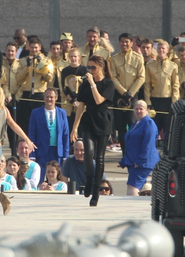 REVEAL USE ONLY: Victoria Beckham doing a warm up performance for the Olympics closing ceremony