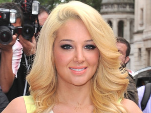Judge Tulisa Contostavlos arriving at The X Factor press launch held at the Corinthia Hotel.
