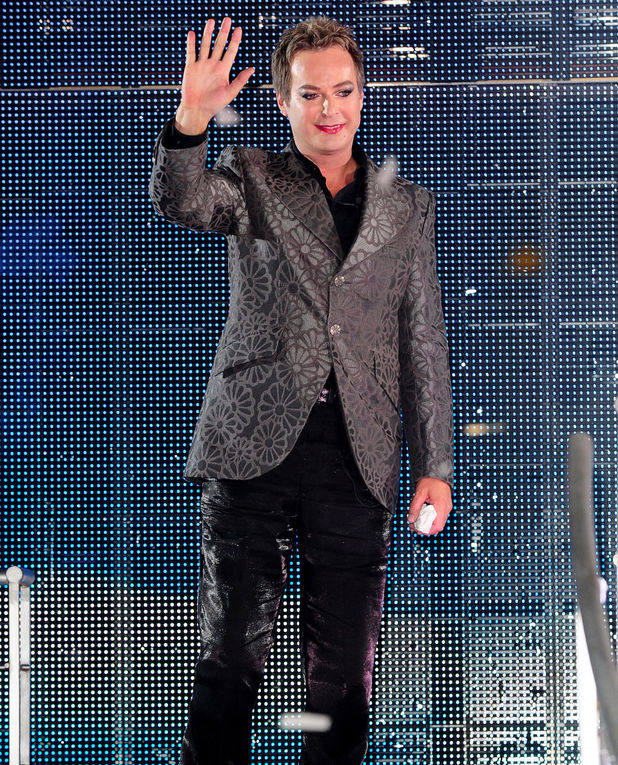 Julian Clary leaves the Celebrity Big Brother House as the winner during the live final at Elstree Studios, Borehamwood.
Picture date: Friday September 7, 2012. Photo credit should read: Ian West/PA Wire