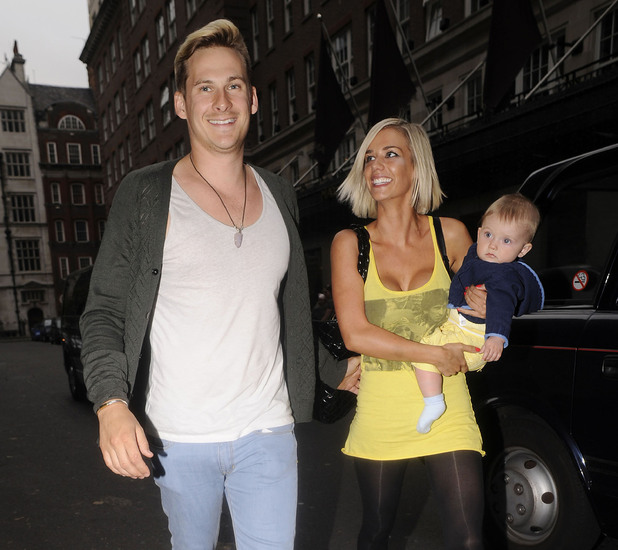 Lee Ryan and his fiancee Samantha Miller pull faces at photographers while out and about with their son Rayn Amethyst Ryan
London, England - 03.06.09
Mandatory Credit: WENN.com