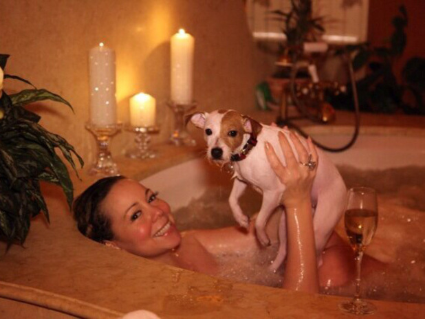 Mariah Carey in bubble bath with dog