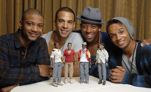 JLS pose with JLS dolls