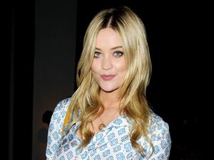 Laura Whitmore looks chic in printed blouse and cigarette trousers
