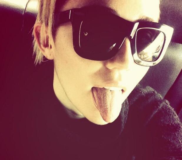 Miley Cyrus sticking her tongue out - December 2014