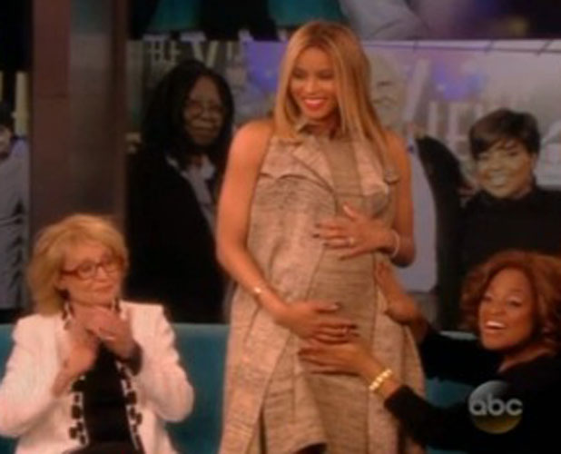 Ciara reveals pregnancy by displaying her baby bump on The View, 14 January 2014