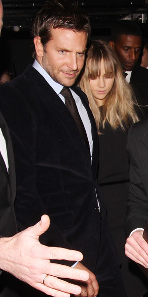 Bradley Cooper, Suki Waterhouse hold hands after Tom Ford LFW: photos