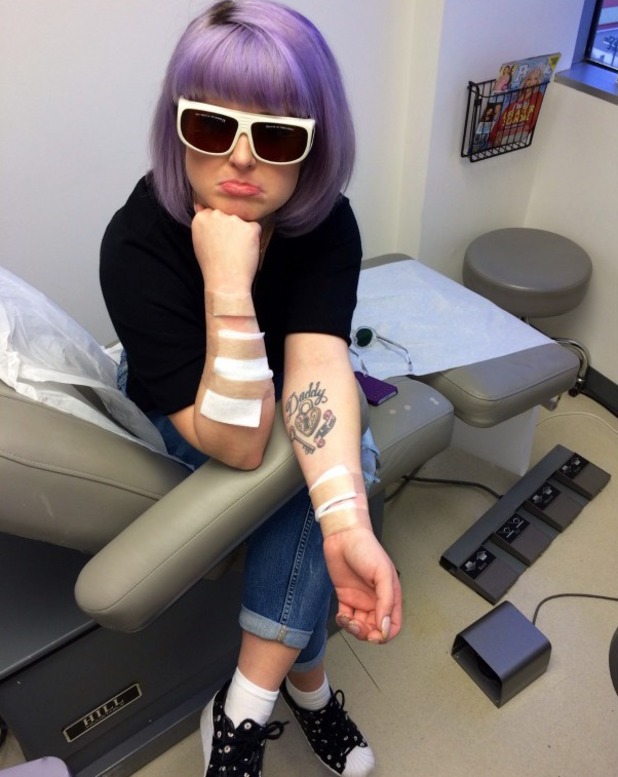 Kelly Osbourne issues warning as she gets third tattoo ...