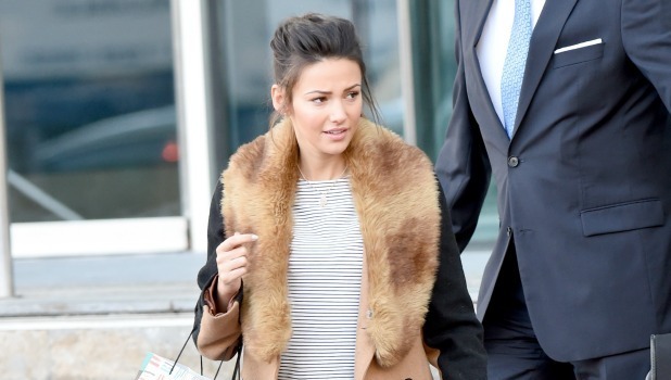 Michelle Keegan leaves the Lowry Hotel in Manchester with a Happy Birthday bag. She was staying with boyfriend Mark Wright. The concierge helped her down the steps with her bag.
24 Jan 2015