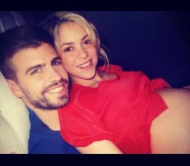 Shakira showing off her baby bump with boyfriend Gerard Piqué