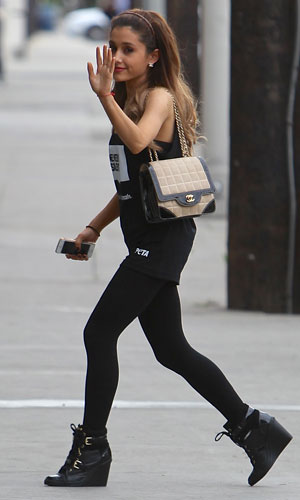 Ariana Grande waves as she arrives at recording studio: photos ...