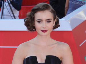 Lily Collins is mesmerising in purple ombre gown at Love, Rosie ...