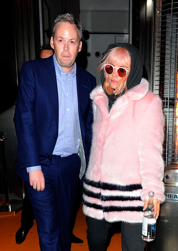 Lily Allen attends party in pink fluffy coat and matching sunglasses ...